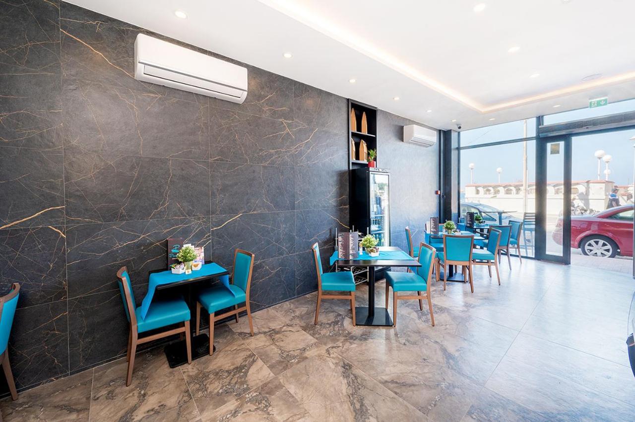 Islet Promenade Seafront Apartment With Large Corner Terrace By Getawaysmalta セント・ポールズ・ベイ エクステリア 写真